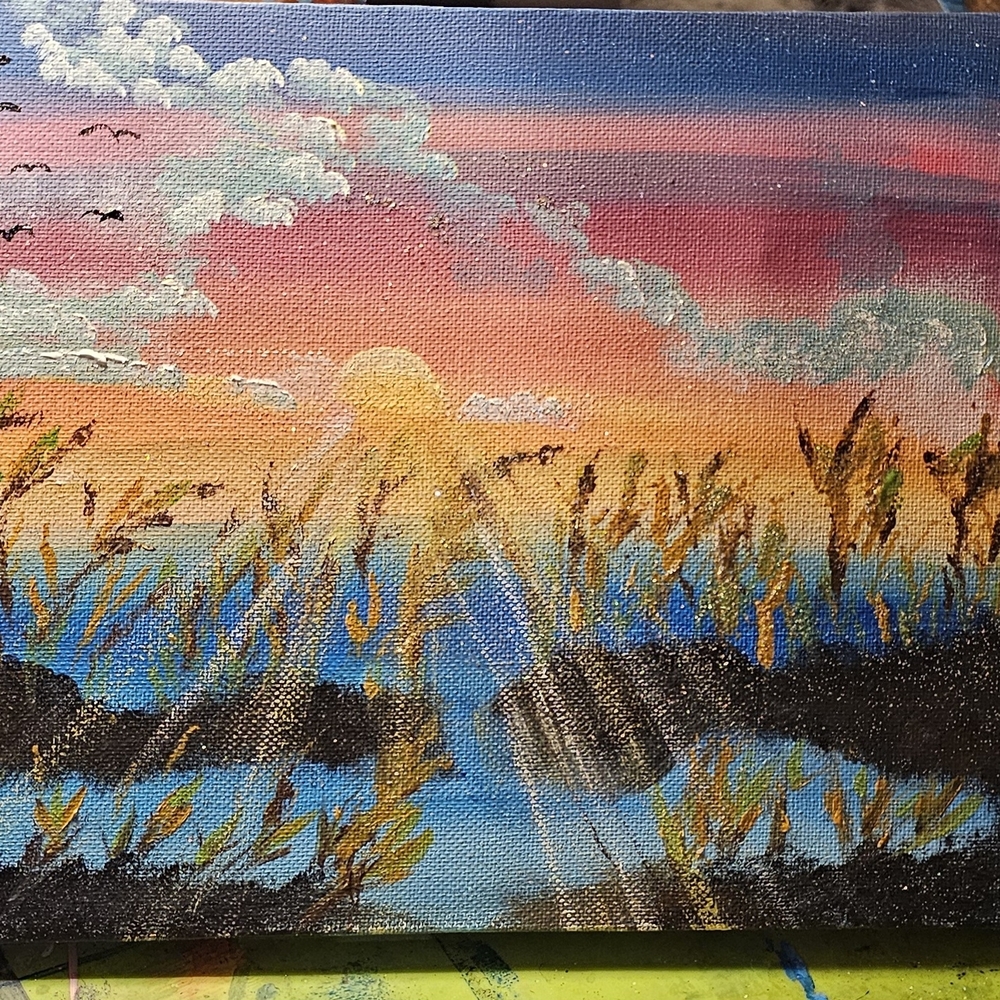 Vibrant Sunrise Over Water Canvas Art